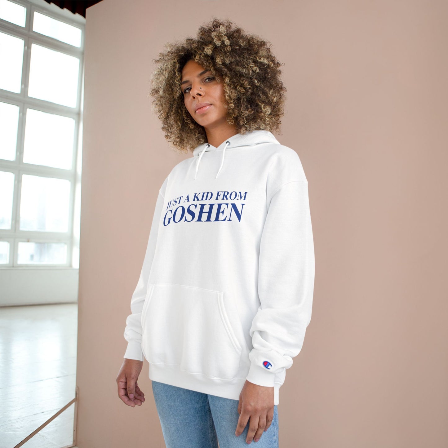 Just a kid from Goshen Champion Hoodie