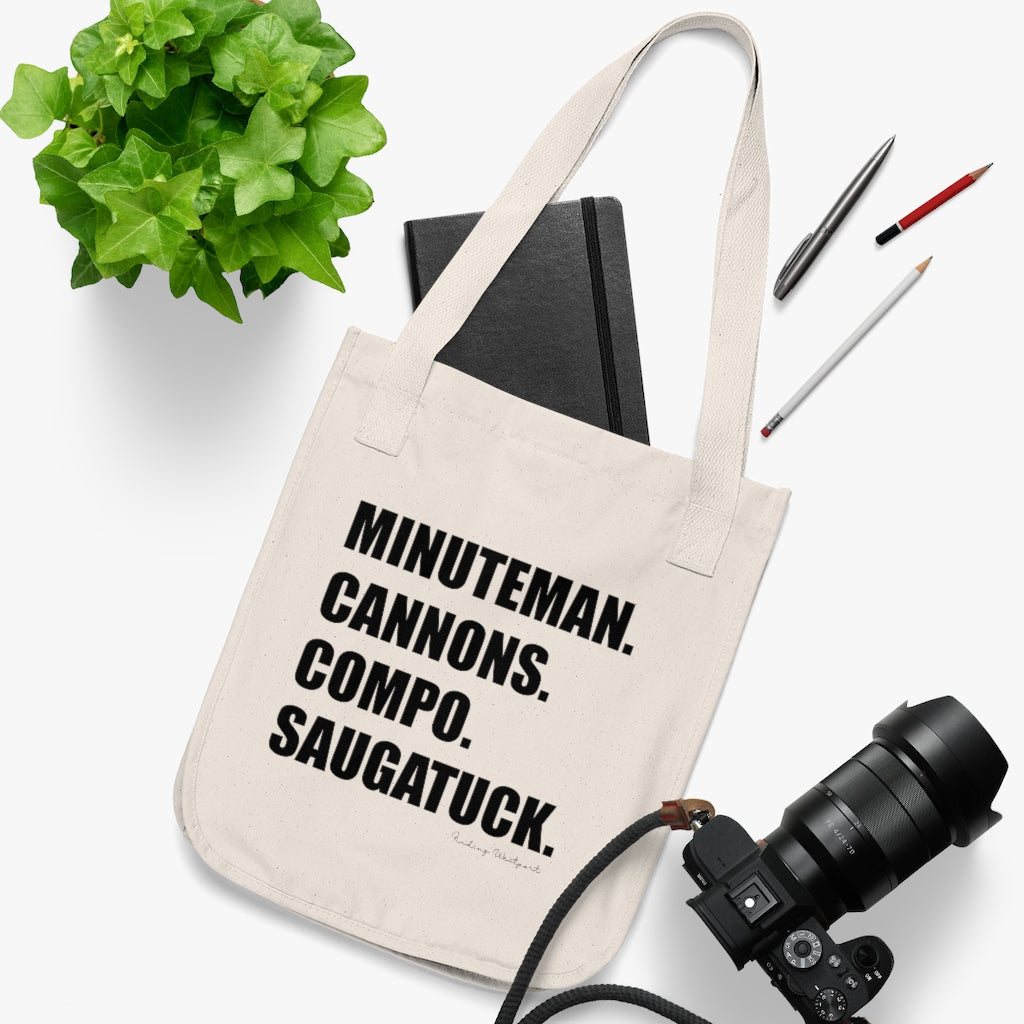 Minuteman. Cannons. Compo. Saugatuck. Organic Canvas Tote Bag How do you say Westport without saying Westport? Westport, Connecticut is filled with unique aspects. Each providing different elements that make up the town from historic to modern traditions. Minuteman. Cannons. Compo. Saugatuck. You know its Westport. Proceeds of this collection goes to help build Finding Westport and Finding Connecticut's brands.