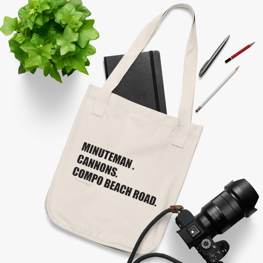 Minuteman. Cannons. Compo Beach Road. Organic Canvas Tote Bag How do you say Westport without saying Westport? Westport, Connecticut is filled with unique aspects. Each providing different elements that make up the town from historic to modern traditions. Minuteman. Cannons. Compo Beach Road. You know its Westport. Proceeds of this collection goes to help build Finding Westport and Finding Connecticut's brands.