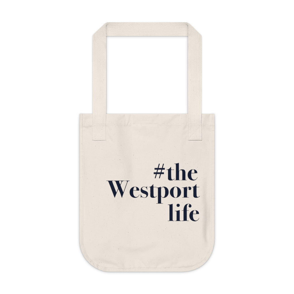 #thewestportlife Organic Canvas Tote Bag Do you live the #thewestportlife? Living the #thewestportlife is a lifestyle and proudly show it off the world that your beach of choice is Compo Beach and you support the local lifestyle. Free USA shipping on all products. Proceeds of this collection goes to help grow Finding Westport and Finding Connecticut’s brand.