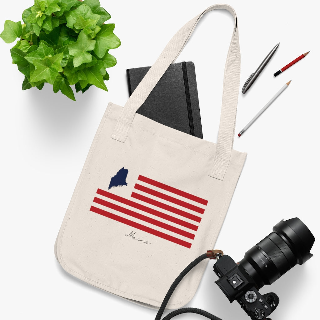 Maine Flag collection has tee shirts, mugs, reusable bags, and other apparel and gifts. All proceeds goes to help build the Finding Maine brand and get our website up and going. Free shipping on all products.