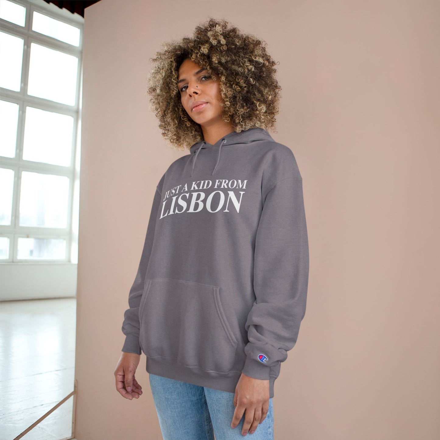 Just a kid from Lisbon Champion Hoodie