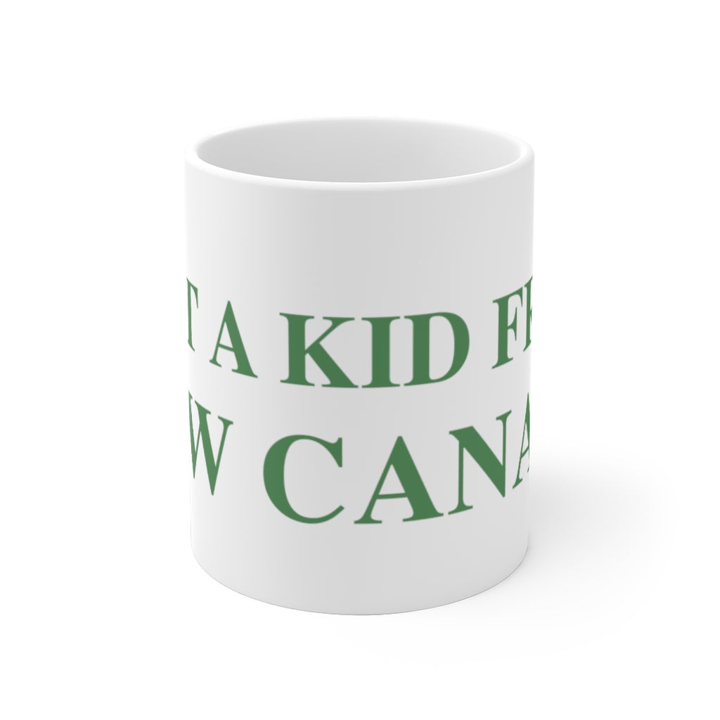  Just a kid from New Canaan White Ceramic Mug  Are you proud to be from New Canaan?  Show the world where you're from New Canaan! Represent New Canaan with this collection!   Proceeds from this collection help grow Finding New Canaan and Finding Connecticut websites and brands. 